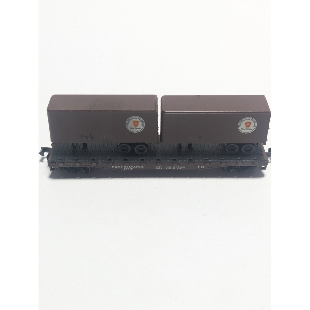 Atlas Vintage Pennsylvania Railroad TrucTrain Flat Car with Dual Trailers Brown